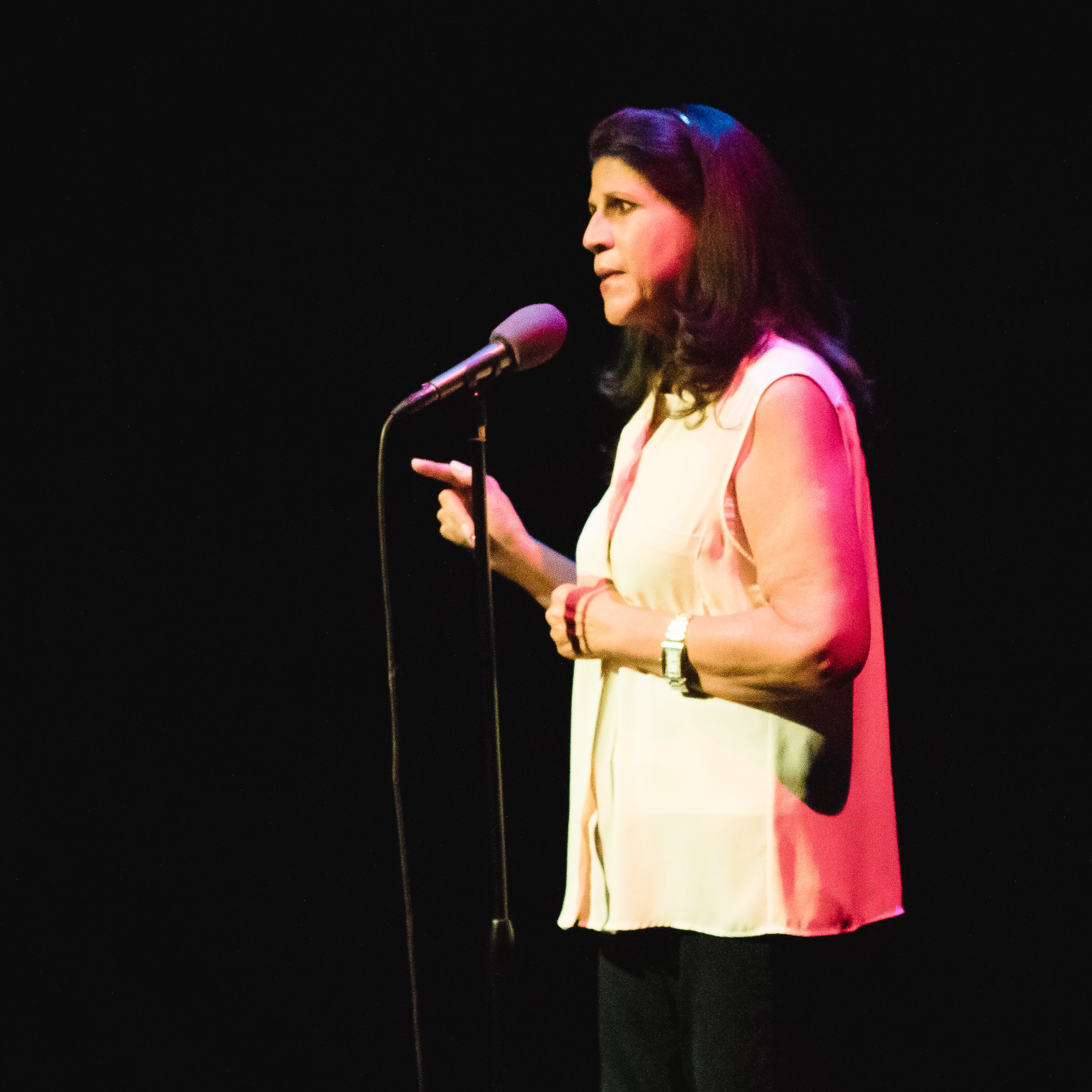 Adele Alvarado telling a story for The Narrators at Buntport Theater, August 2018